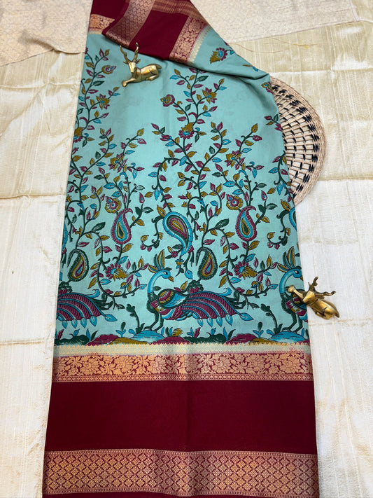 Semi Crepe Silk Saree with Peacock and Floral print | Blue with Red Border